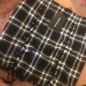Pretty little thing lace up plaid skirt